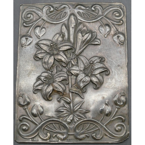 173 - A Birmingham silver rectangular shaped panel with embossed floral and scroll decoration, maker's mar... 