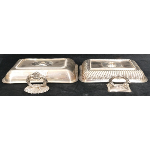 177 - A silver plated rectangular entrée dish with gadroon rim with cover, 29cm wide, a smaller entrée dis... 