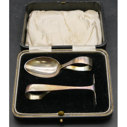 179 - A Birmingham silver child's spoon and pusher in fitted black leather case, 1.1oz