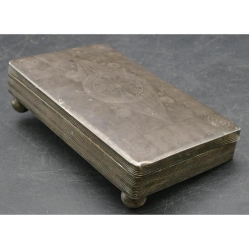 187 - A Continental silver coloured metal rectangular shaped box with hinged lid and engraved decoration o... 