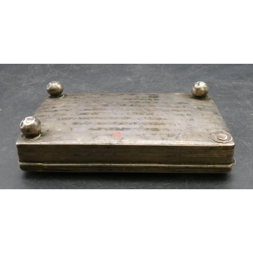 187 - A Continental silver coloured metal rectangular shaped box with hinged lid and engraved decoration o... 