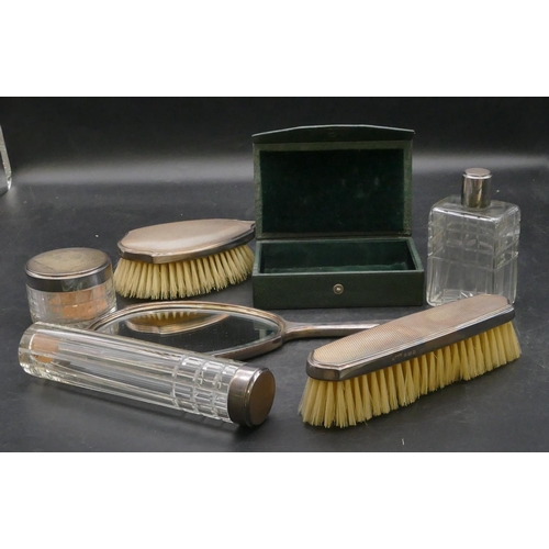 197 - A Mappin & Webb dressing table set with engine turned decoration, 3 scent bottles, hand mirror, 2 br... 