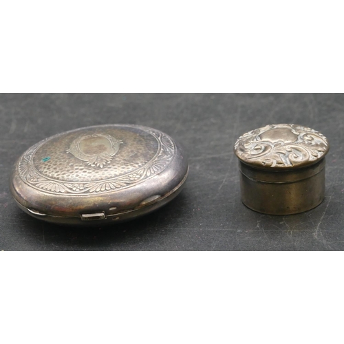 199 - A miniature Birmingham silver round pill box with embossed lid, a silver coloured metal circular com... 