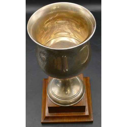 209 - An Edward VII silver round bulbous trumpet shaped trophy (War engraved presentation) with square oak... 