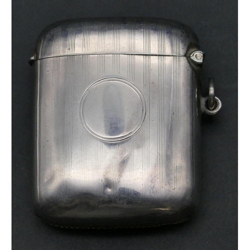 224 - A Birmingham silver concaved shaped vesta case with part decoration and hinged lid, 6cm high, 1.3oz