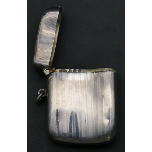 224 - A Birmingham silver concaved shaped vesta case with part decoration and hinged lid, 6cm high, 1.3oz