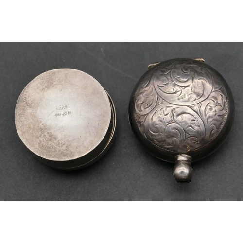 225 - A small 925 circular silver pill box with cover and engraved scroll decoration, also a silver Sovere... 