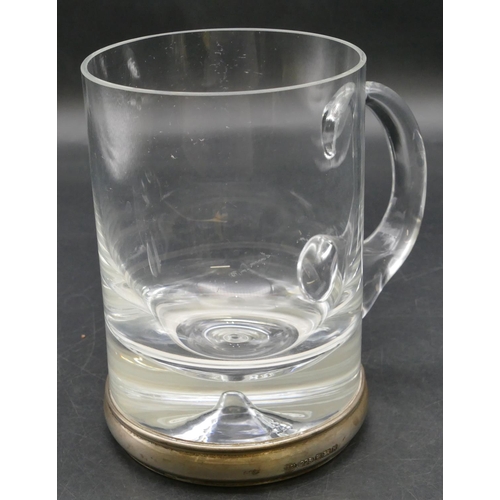 230 - A heavy plain glass tankard with Birmingham silver base, 14cm high