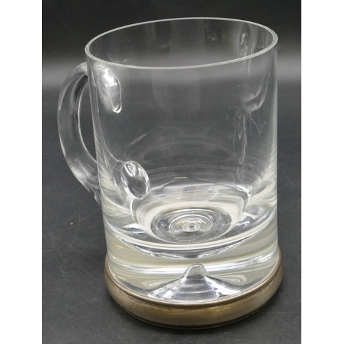 230 - A heavy plain glass tankard with Birmingham silver base, 14cm high