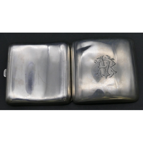 235 - A Sheffield silver plain concave shaped cigarette case with engraved monogram, 9.2cm high, 4.5oz