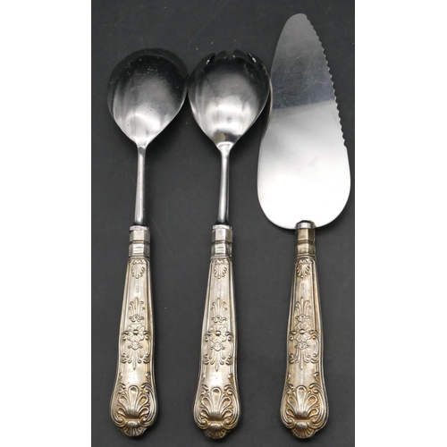 240 - A pair of Sheffield silver handled salad servers with embossed decoration and a similar Sheffield si... 