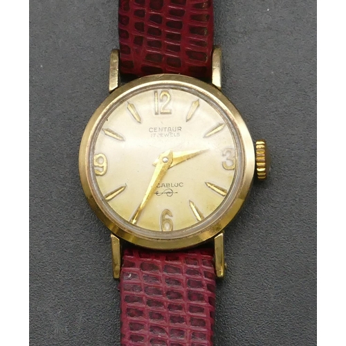 246 - A 9ct gold ladies' Centaur circular wristwatch with red leather strap, approx. 6.3 grams gross witho... 