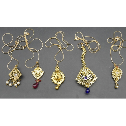 253 - 5 various modern gilt metal brooches with chains