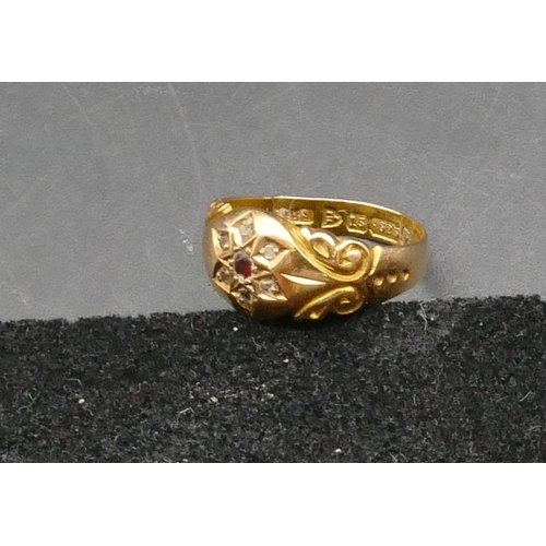 256 - A 15ct gold small ladies' ring set with centre garnet, Size G, 3 grams gross