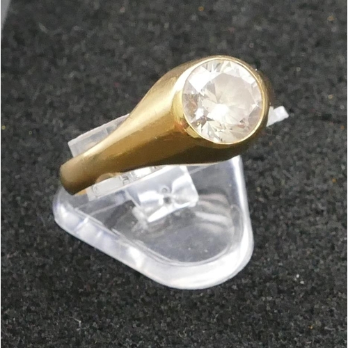 257 - An 18ct gold ring set with clear stone, Size U/V, 4.2 grams gross