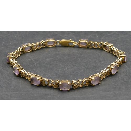 260 - A 9ct gold bracelet set with pale purple stones, 20cm long, 10.9 grams gross