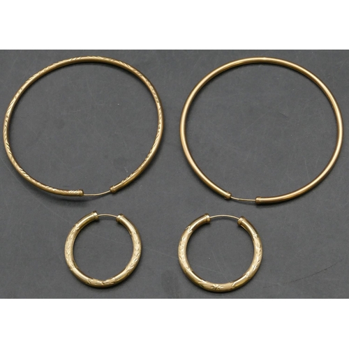 266 - A pair of large gold circular drop earrings, 6cm diameter, a pair of gold circular earrings, 4.8 gra... 