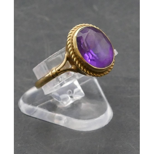 278 - A 9ct gold ladies' oval ring set with amethyst, Size N, 2.1 grams gross