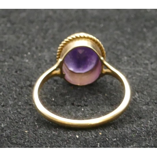 278 - A 9ct gold ladies' oval ring set with amethyst, Size N, 2.1 grams gross