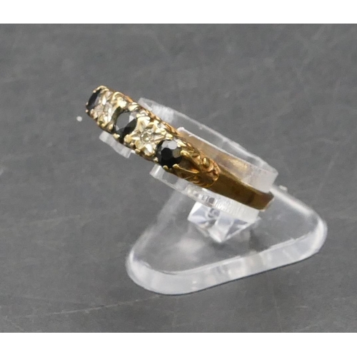 279 - A 9ct gold ladies' boat shaped ring set with 3 sapphires interspersed by 2 small diamonds, Size O, 2... 