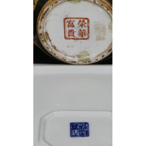 28 - A modern Oriental 2-handled rectangular shaped tray with multicoloured river landscape, floral, leaf... 