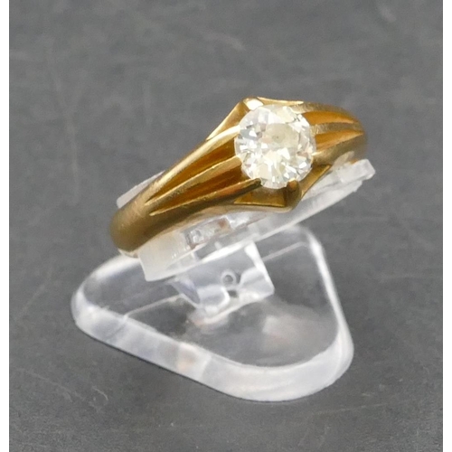 280 - An 18ct gold solitaire diamond ring with reeded shoulders, approx. 0.70 carat, Size M/N, 4.8 grams