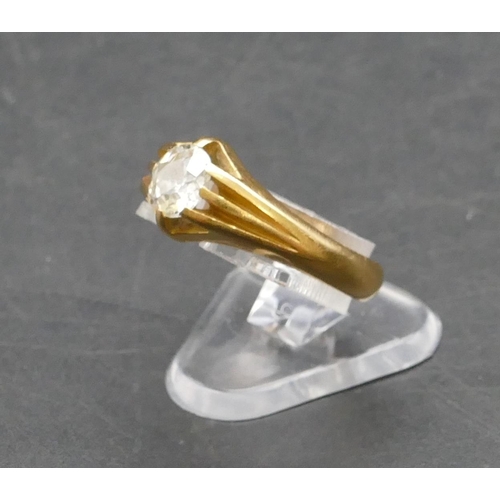 280 - An 18ct gold solitaire diamond ring with reeded shoulders, approx. 0.70 carat, Size M/N, 4.8 grams