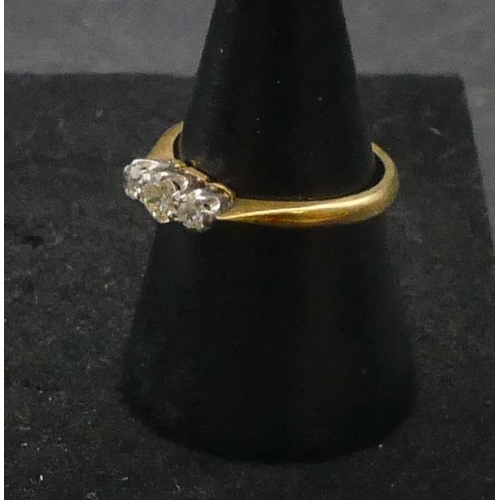 283 - An 18ct gold ladies' 3-stone diamond ring (centre diamond approx. 0.15 carat), Size M/N, 2.5 grams g... 