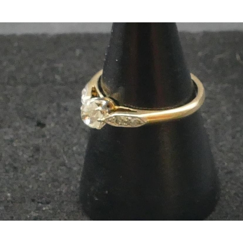 285 - An 18ct gold ladies' solitaire diamond ring, stamped Bravingtons (centre diamond approx. 0.25 carat)... 