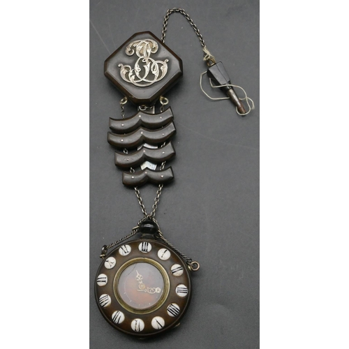 304 - A horn and silver coloured metal drop fob watch with fob, raised white enamelled Roman numerals and ... 