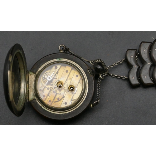 304 - A horn and silver coloured metal drop fob watch with fob, raised white enamelled Roman numerals and ... 