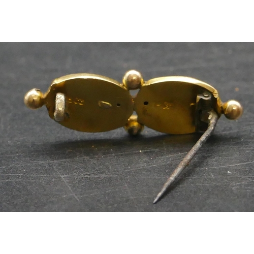 309 - A 15ct gold double oval shaped brooch, 3.2cm long, 1.9 grams