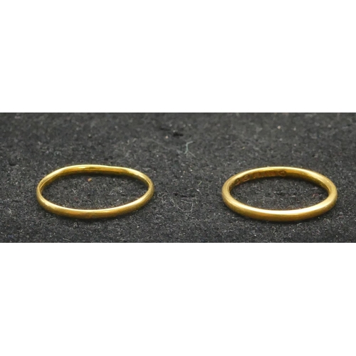 311 - A 22ct gold wedding ring, Size J/A, a similar gold wedding ring, Size M/N 3.1 grams (2)