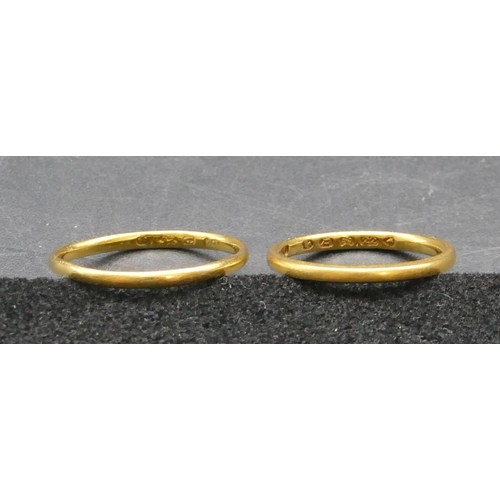 311 - A 22ct gold wedding ring, Size J/A, a similar gold wedding ring, Size M/N 3.1 grams (2)