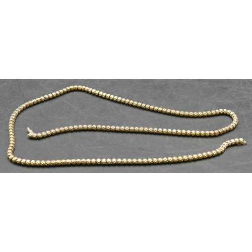 312 - A 9ct gold ball shaped necklace, 39.8cm long, 6.4grams