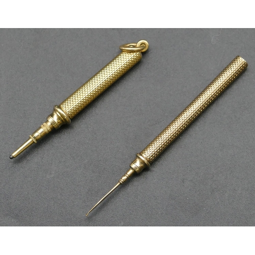 314 - S Mordan & Co, small gold propelling pencil with engine turned decoration, 6.3cm long open, a part g... 