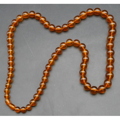 319 - An amber style bead necklace