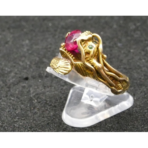 345 - A 14ct gold gent's ring in the form of a dragon, mounted with red stone, Size V/W, 6.5 grams gross