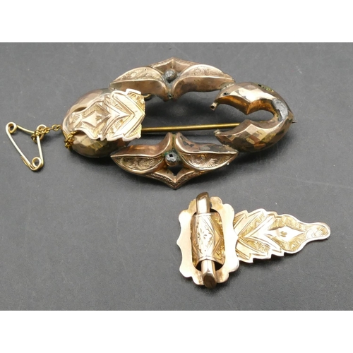 348 - A gold scallop shaped brooch with leaf decoration (a/f), 5.5cm wide, 6 grams gross