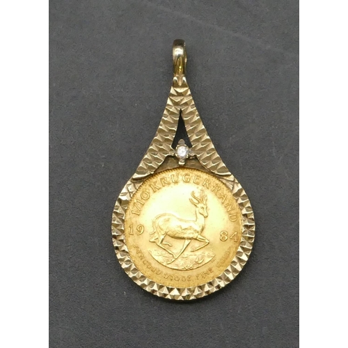 380 - A South African 1/10 Krugerrand 1984 mounted in 9ct gold removable pendant, 4.9 grams gross