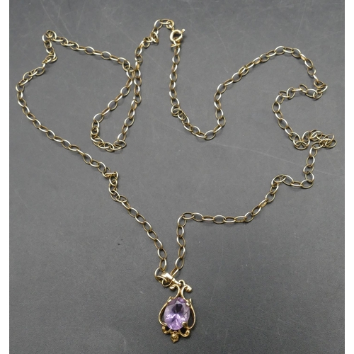 384 - An amethyst drop pendant mounted on 9ct gold chain, overall weight 4.1 grams gross