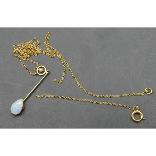 385 - A 15ct gold drop pendant set with an opal, mounted on a chain (chain a/f), 1.9 grams gross