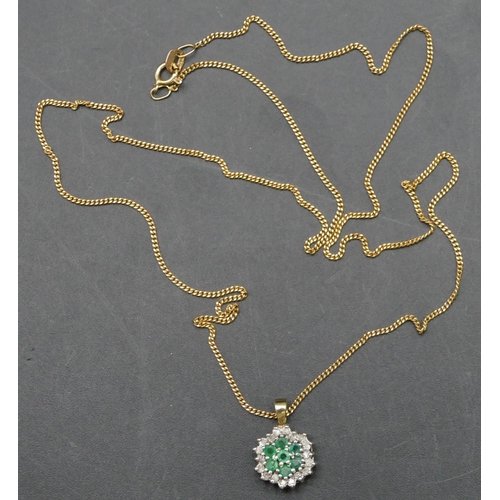 386 - A 9ct gold small circular pendant set with small emeralds and diamonds with gold chain, overall weig... 