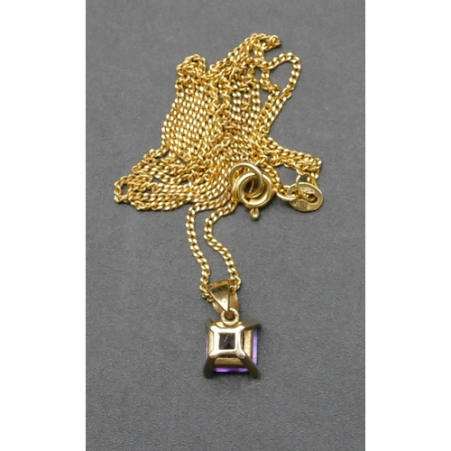 387 - A 9ct gold amethyst pendant on a 9ct gold chain, overall weight 2.6 grams gross