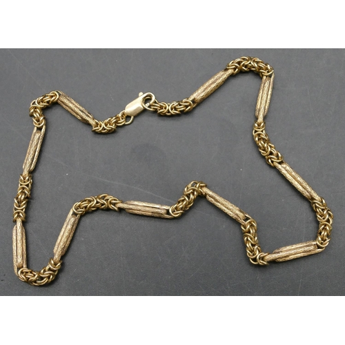 395 - A 9ct gold bar and multi linked chain, 35.5cm long, 13.5 grams