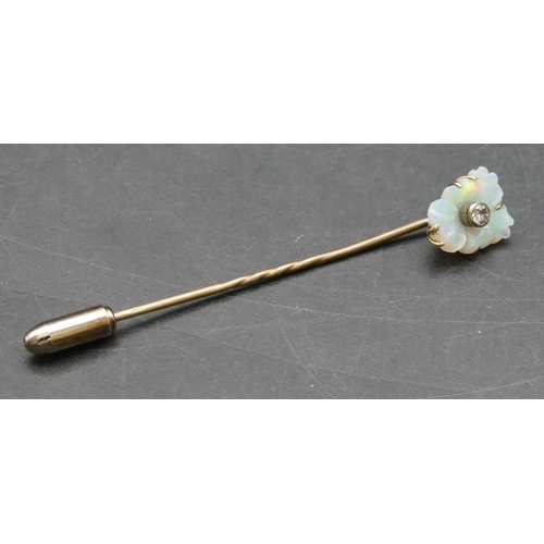 400 - A gold stickpin with Mother of Pearl top, inset with small diamond (cased), 2.3 grams gross