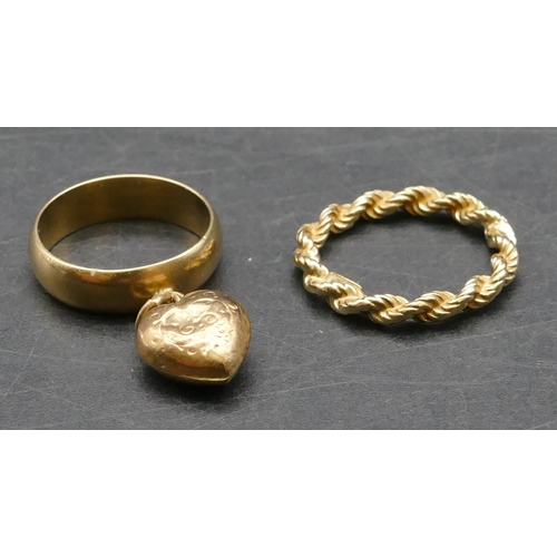 405 - A 9ct gold wedding ring mounted with drop heart shaped motif, Size K, also a 9ct gold twist wedding ... 