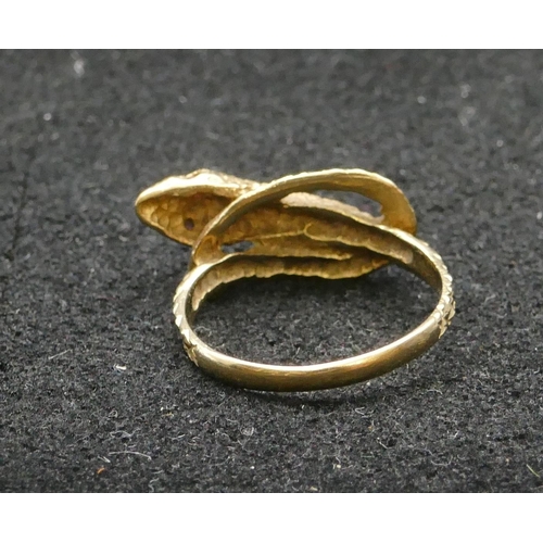 406 - A 9ct gold twist serpent ring, Size N, 2.6 grams