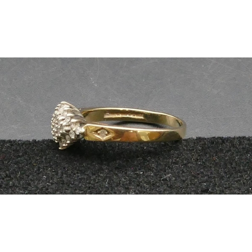 408 - A 9ct gold ladies' cluster ring set with small diamond chips, Size M/N, 2.1 grams gross