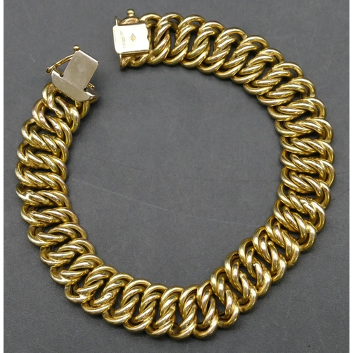 416 - A 9ct gold flat linked bracelet, 19.5cm long, 20.8 grams